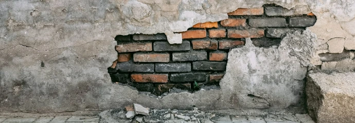 brown brick wall during daytime